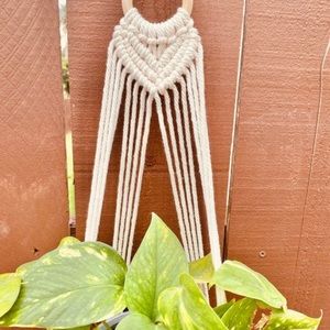Heart Handmade macrame plant hanger.